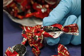 تریاک در بسته شکلات کاکاوئی ایرانی به مقصد کانادا(عکس)